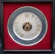 A Danbury Mint silver plate produced top commemorate the 25th Anniversary of the Coronation of Her