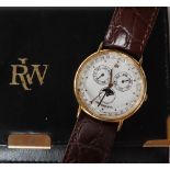 An 18ct gold plated Raymond Weil, month, day and date moon phase wristwatch, with papers,