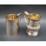 A George III silver christening mug of baluster form, decorated with leaves on a spreading foot,