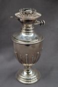 A Victorian silver oil lamp, of vase shape with a beaded rim and spreading foot, Sheffield, 1893,