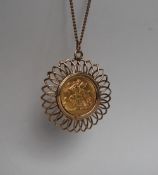 An Elizabeth II gold sovereign dated 1968, in a 9ct yellow gold slip mount on a yellow metal chain,