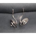 A pair of Georg Jensen silver drop earrings of spiral form, 50mm long, marked with trademark, Torun,