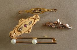 A 9ct gold bar brooch paste and seed pearl set together with two other 9ct gold bar brooches,