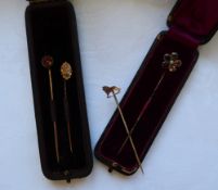 A Victorian 15ct gold stick pin, set with a diamond chip,