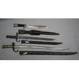 A French 1864 sabre bayonet and scabbard together with a Japanese Arisaka 1897 pattern bayonet and