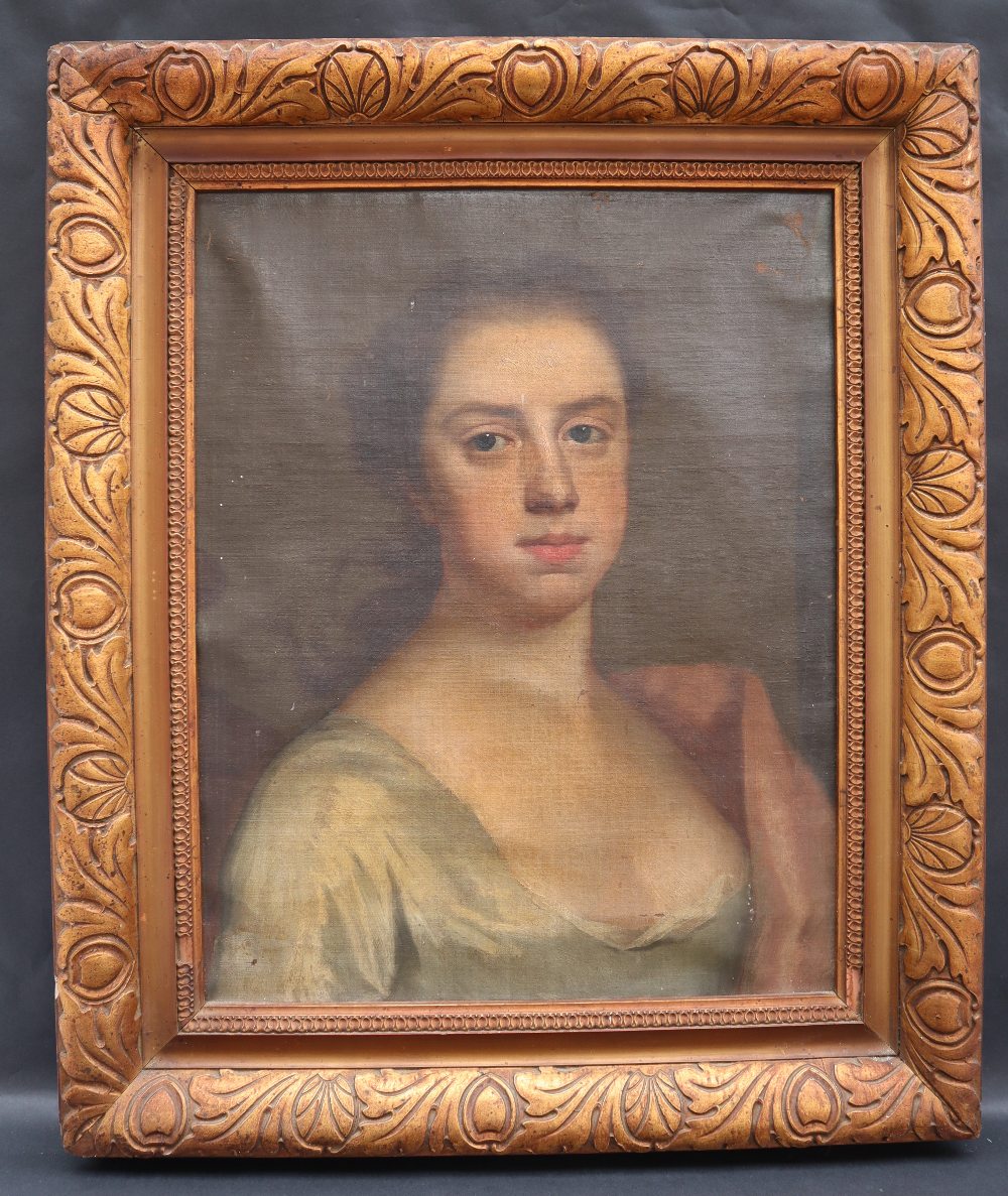 19th century British School Head and shoulders portrait of a young lady Oil on canvas 47.5 x 37.