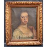 19th century British School Head and shoulders portrait of a young lady Oil on canvas 47.5 x 37.