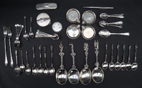 A set of four Victorian silver anointing spoons with figural terminals, London, 1888,