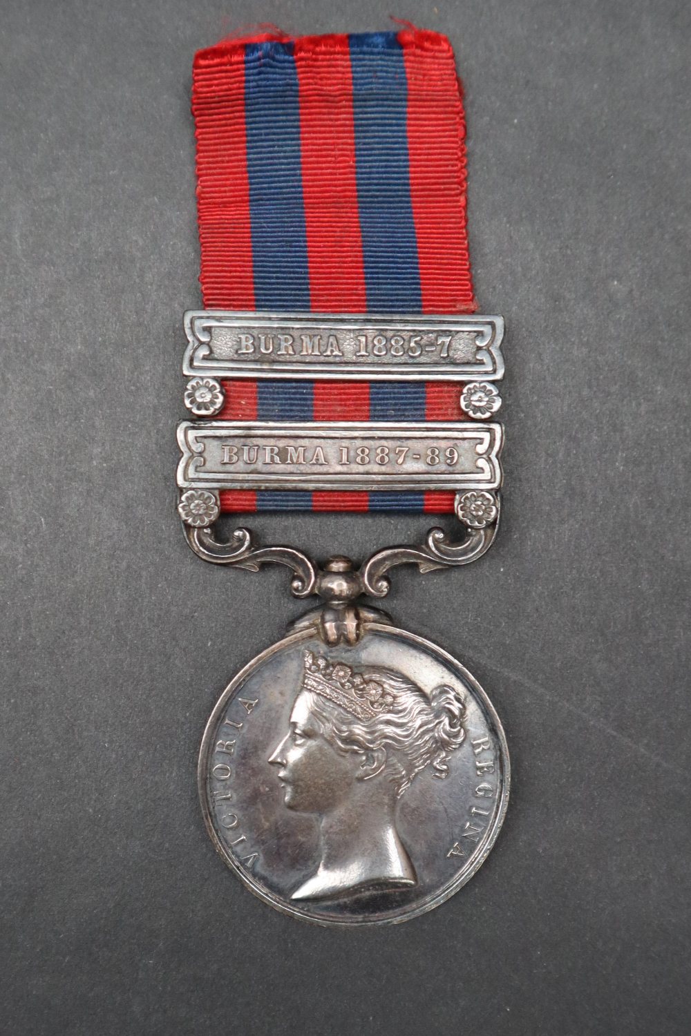 A Victorian Indian General service medal with two bars for Burma 1885-7 and Burma 1887-89 awarded