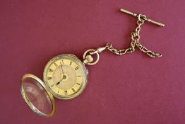 An 18ct yellow gold keyless wound fob watch with a gilt dial and Roman numerals, 40mm diameter,