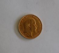 An Edward VII gold sovereign, dated 1910,