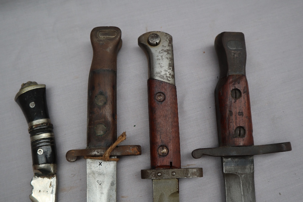 A British 1888 pattern MKI 2nd type bayonet and scabbard together with a German bayonet, - Image 4 of 6