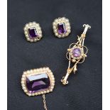 An amethyst and seed pearl brooch of rounded rectangular shape,