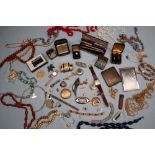 Assorted costume jewellery including beaded necklaces, cigarette case,