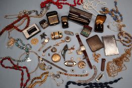 Assorted costume jewellery including beaded necklaces, cigarette case,