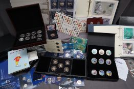 A collection of Westminster coin sets including a 2020 Jersey Charles Dickens (1812-1870) silver