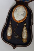 A Victorian shell cameo brooch and earrings set,