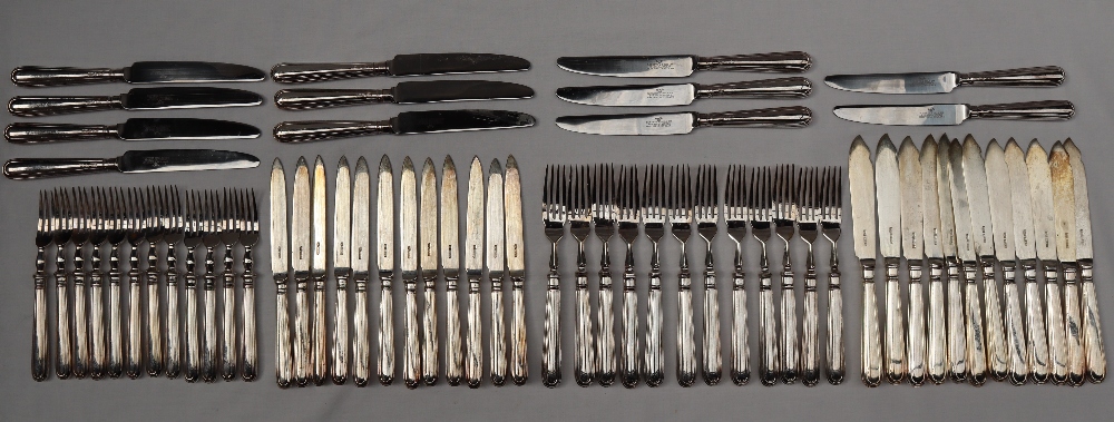 An Elizabeth II silver part flatware service, comprising twelve fish forks, twelve fish knives,