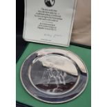 An Elizabeth II silver plate designed by Doris Lindner in commemoration of the achievements of