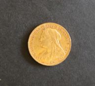 A Victorian gold sovereign dated 1898,