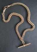 A 9ct yellow gold double Albert watch chain with individually hallmarked twisted oval links,
