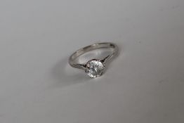 A paste set ring in the form of a solitaire to a 9ct gold and platinum setting and shank, size L,
