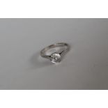 A paste set ring in the form of a solitaire to a 9ct gold and platinum setting and shank, size L,