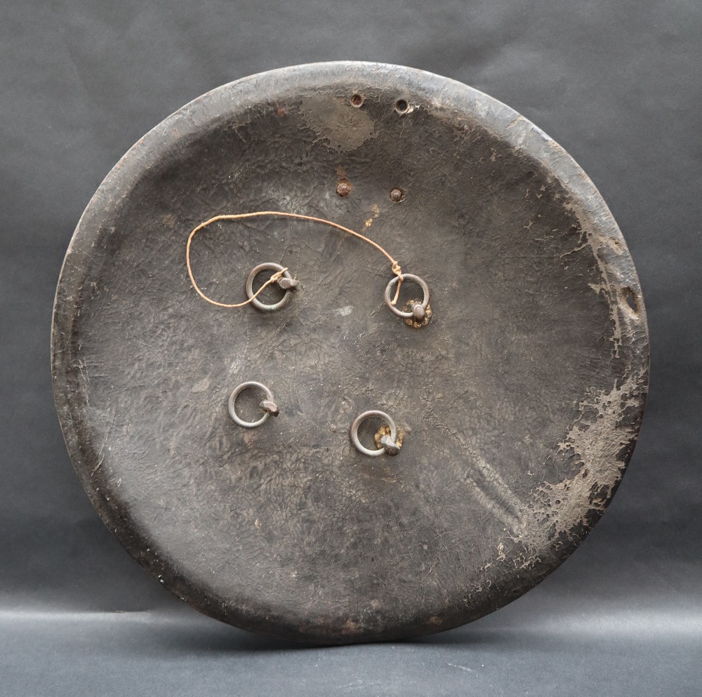 A leather shield of circular domed form with an applied copper crescent and four copper domes, - Image 3 of 3