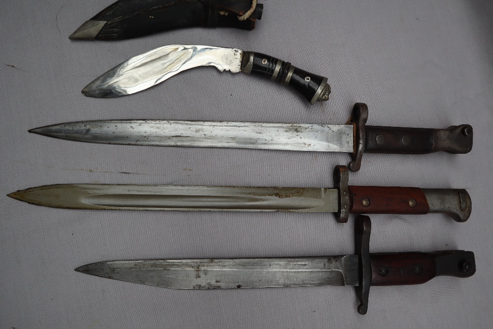 A British 1888 pattern MKI 2nd type bayonet and scabbard together with a German bayonet, - Image 2 of 6