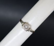 A solitaire diamond ring, set with a round old cut diamond,