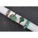 A 9ct yellow gold ring set with a green carved jade panel, size N,