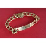 A yellow metal identity bracelet with interlocking oval links, valued as 9ct gold,