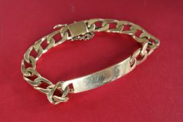 A yellow metal identity bracelet with interlocking oval links, valued as 9ct gold,
