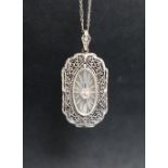 An Edwardian white metal pendant,