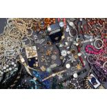 A large quantity of costume jewellery including wirework brooches, necklaces, bracelets, cufflinks,