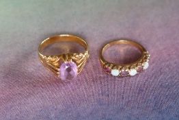 A 9ct gold amethyst set dress ring set with an oval faceted amethyst to a 9ct gold setting and