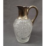 A George V silver topped and hobnail cut glass claret jug, with a leaf thumb piece, Sheffield, 1922,