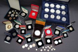 A collection of silver and other coins, including 1990 silver proof five pence two coin set,