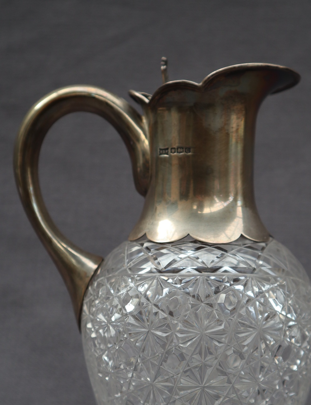 A George V silver topped and hobnail cut glass claret jug, with a leaf thumb piece, Sheffield, 1922, - Image 2 of 5