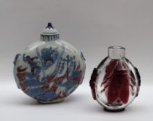 A Chinese blue and white porcelain snuff bottle of circular form decorated with figures fighting a