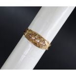 A Victorian 15ct gold mourning ring set with half pearls and diamond chips,