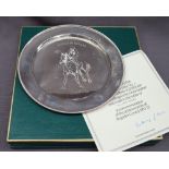 An Elizabeth II silver plate designed by Doris Lindner in commemoration of the achievements of