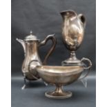 A continental white metal baluster hot water pot on three legs and hoof feet together with a large