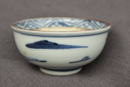 A small Japanese porcelain bowl, painted to the edge in blue with a landscape scene, 6.