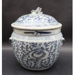 A Chinese porcelain pot and cover, the domed lid with lion dog finial,