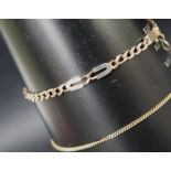 A 9ct yellow gold bracelet with oval and twisted links, together with a 9ct gold necklace,