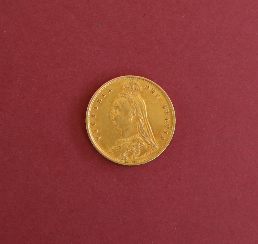 A Victorian gold shield back half sovereign dated 1887