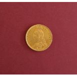 A Victorian gold shield back half sovereign dated 1887