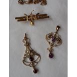 An Edwardian 9ct gold amethyst seed pearl pendant together with another Edwardian 9ct gold pendant,