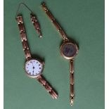 A 9ct gold wristwatch with an enamel dial and Roman numerals on a 9ct gold expanding bracelet strap,